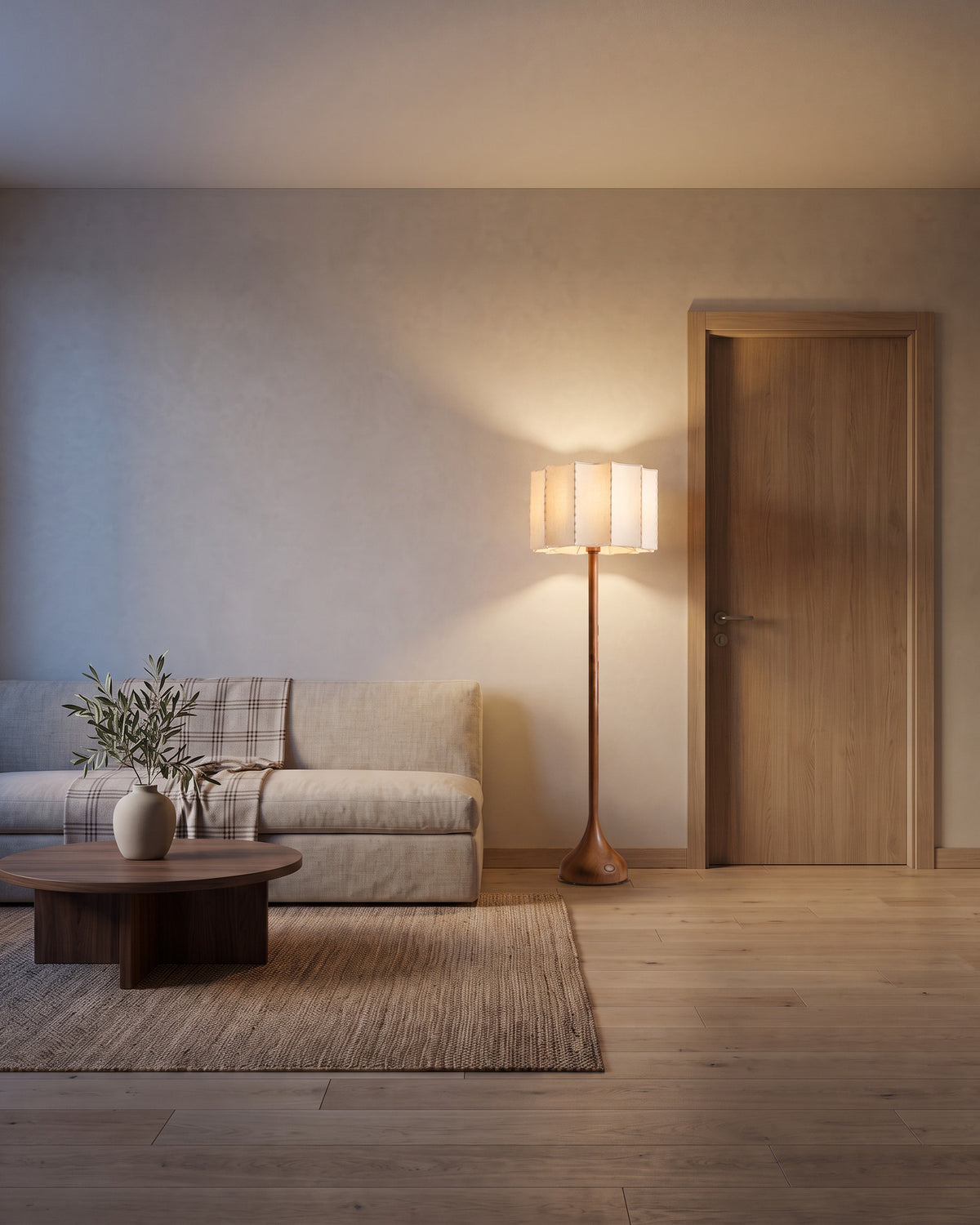 Lampadaire Fût (bois tourné et tissu festonné) dans une pièce, allumé en soirée