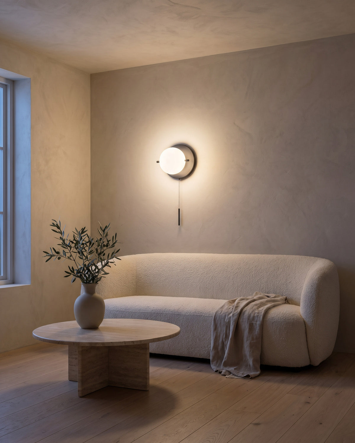 Applique Éclipse, dans un salon, en soirée