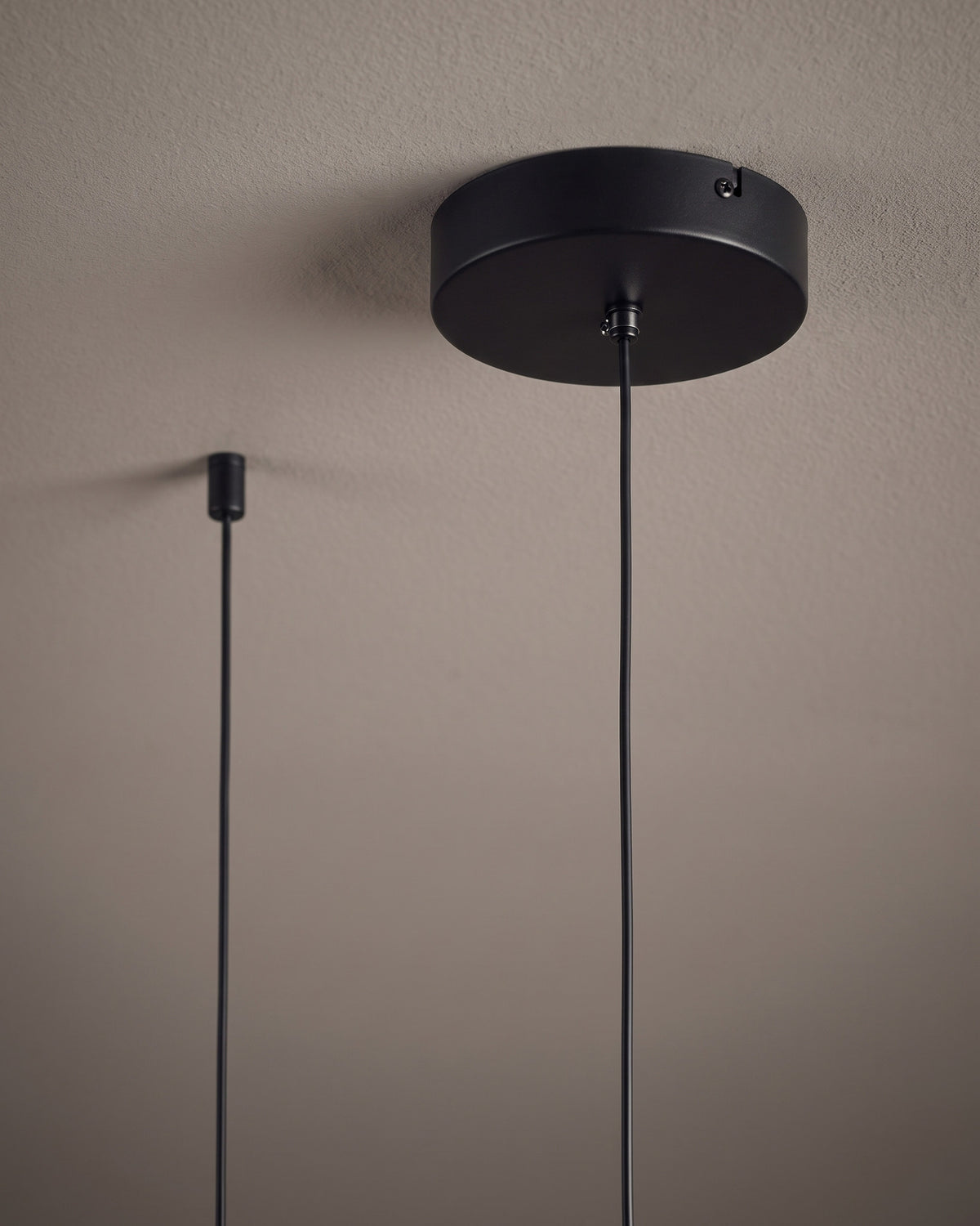 Suspension Houle : détail technique (fixation, câble ou douille)